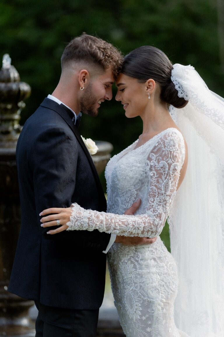 romantic bride and groom forehead to forehead